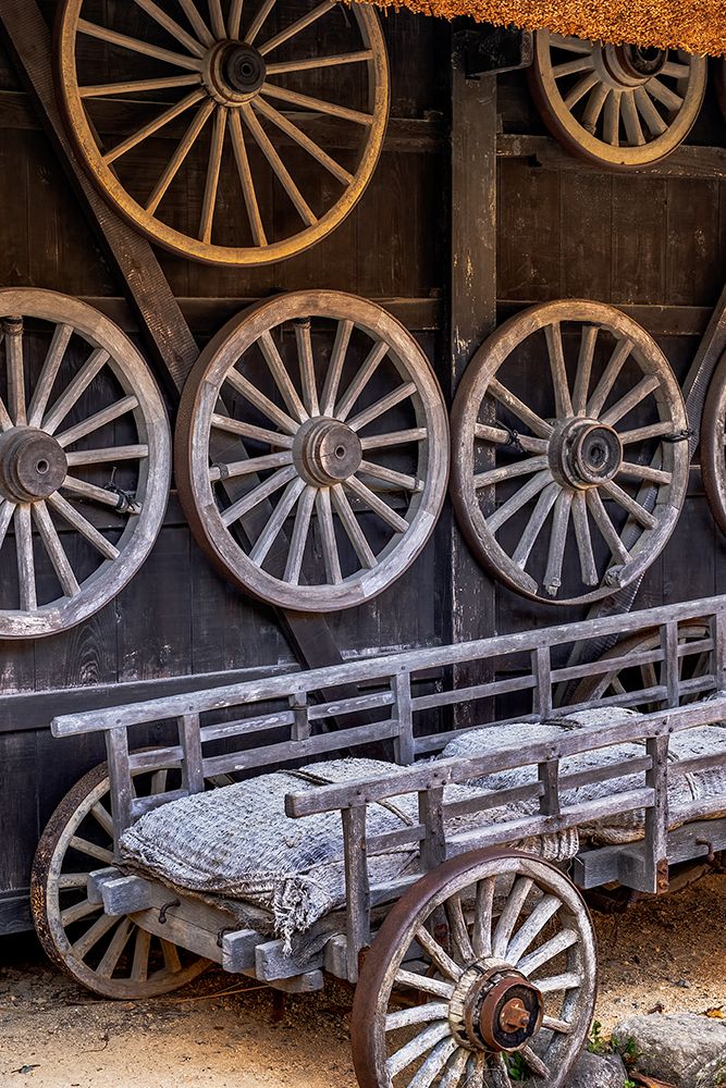 Wooden wagon wheels, Old Yoshimaya house, Hida No Sato, Hida Folk Village, Takayama, Japan